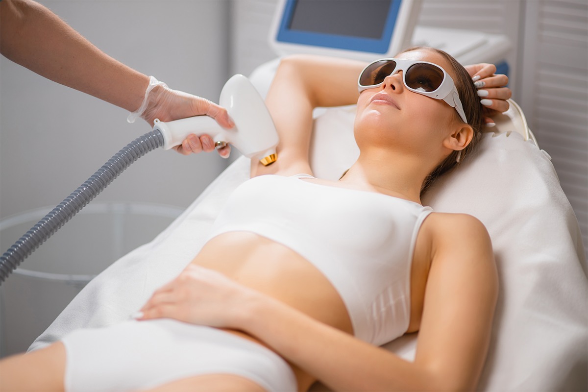 Woman happily getting laser hair removal in Santa Clarita.